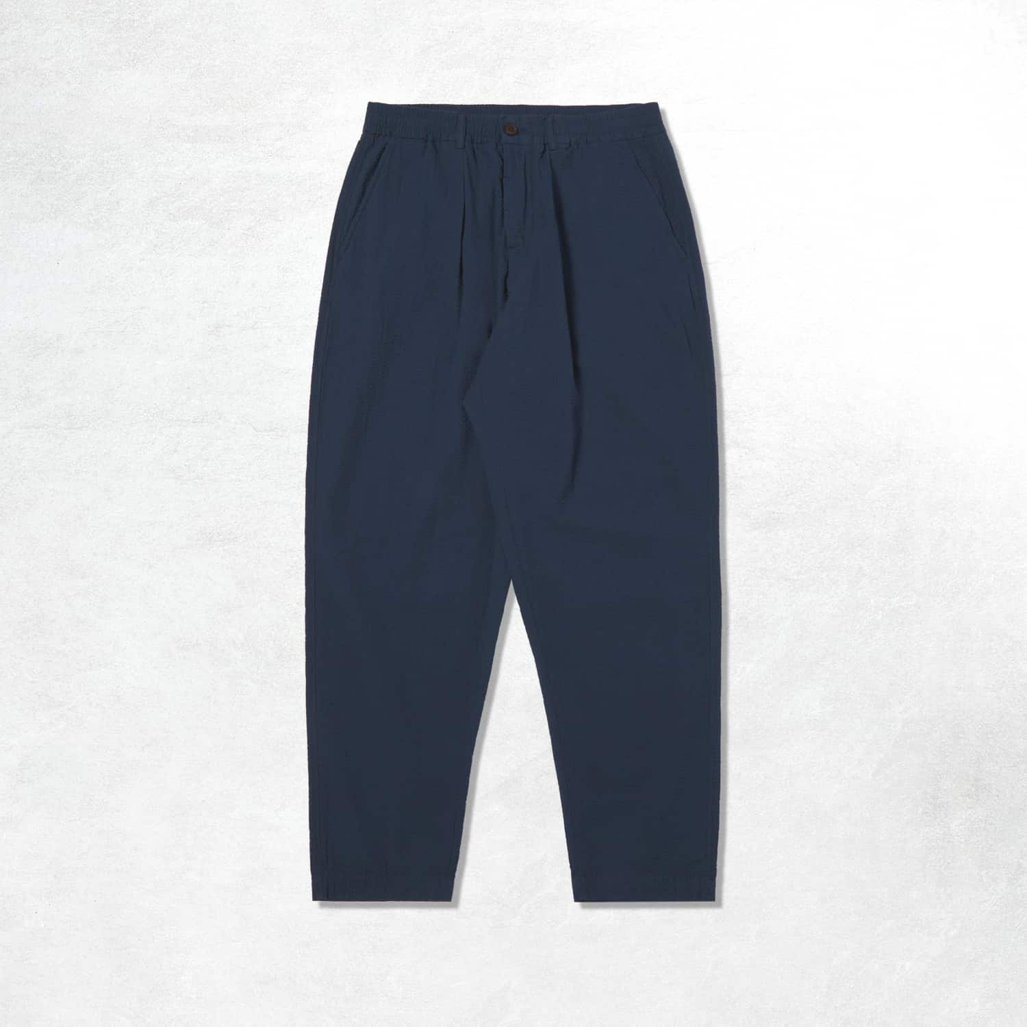 Universal Works Pleated Track Pant: Navy Cotton Seersucker (Front)