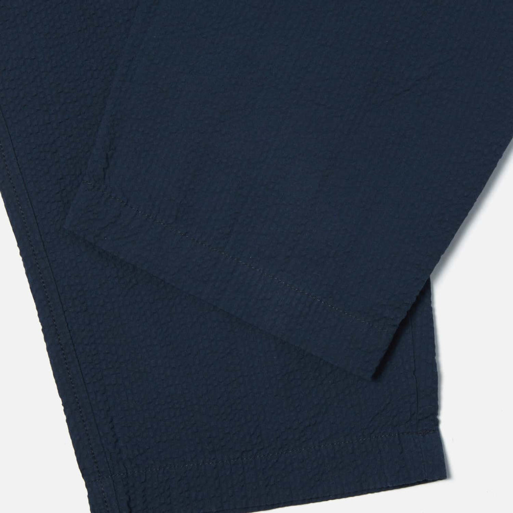 Universal Works Pleated Track Pant: Navy Cotton Seersucker
